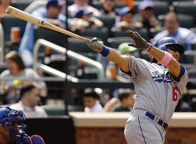 AP Photo/Marcio Jose Sanchez New York Mets’ Ike Davis drives in the go-ahead run double against the San Francisco Giants Sunday during the 10th inning of a baseball game in San Francisco. The Mets won, 4-3.