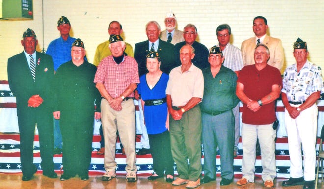 2010-2011 OFFICERS...Installed at the recent American Legion Post 167 Installation and Awards Banquet in Plaquemine were the organization’s new officers: front row, from left, Commander Jimmy Barbee, Third Vice Commander Ron Hall, Finance Officer Rodney Ducharme, Adjutant Barbara Thibodeaux, Committee Member Louis Sanchez, Committee Member Ralph Devillier, Sergeant At Arms Danny Gulotta, Chaplain Earl Devillier; and, second row, First Vice Commander Steve LeJeune, Second Vice Commander Danny Sanchez, Color Bearer Russell Gerace, Color Bearer Ronnie Rockforte, Committee Member Wayne Gomez, and Judge Advocate Thomas McCormick.