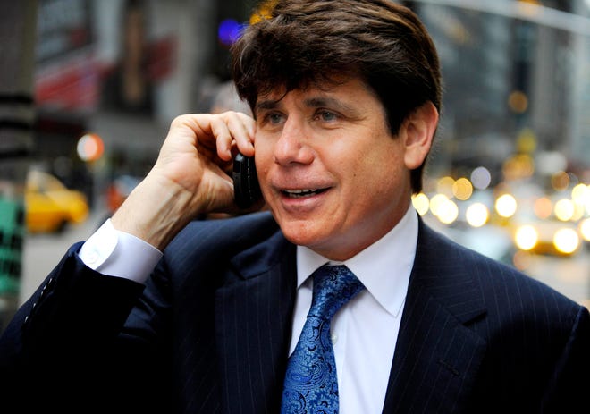In this Jan. 27, 2009 file photo, then-Illinois Gov. Rod Blagojevich speaks on his cell phone before making an appearance in New York on a television program. In wiretap phone recordings played by prosecutors at his ongoing corruption trial in Chicago, the foul-mouthed former governor bashes everyone from politicians and reporters to Illinois voters and even his own wife, Patti. Whether the verbal attacks the FBI caught on tape in the weeks before Blagojevich's arrest in 2008 leave a lasting impression on the public _ let alone on jurors _ remains to be seen. (AP Photo/Stephen Chernin, File)