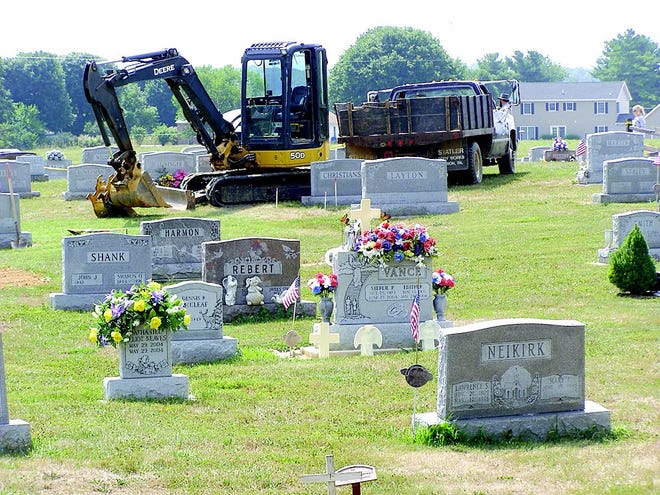 The body of Janet Christiansen Abaroa, 25, Durham, N.C., was exhumed Monday afternoon from the family plot in Brown’s Mill Cemetery. The exhumation was conducted at the request of Durham prosecutors for evidence recovery, and approved by Franklin County Judge Douglas Herman July 9. Abaroa’s husband Raven Abaroa was charged this year with her 2005 murder. Forensic Pathology Associates at Lehigh Valley Medical Center, Allentown, planned to take fingerprints, make casts of her hands, examine weapon markings on the skeleton, and determine if she was wearing contact lenses when she died. The body was to be reinterred Wednesday. Abaroa’s family now lives out of state.