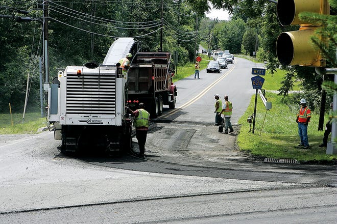 Photo by Anna Murphey/New Jersey Herald
 
Crews were busy Thursday afternoon milling the old pavement at the intersection of county Routes 519 and 626 in Hampton. Street sweepers were busy with prepaving preparation along Route 519, turning it into a one-lane road. The paving, which is scheduled to begin today, should take about six days.