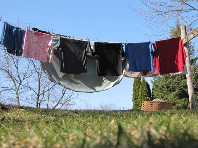 Hang your laundry outside to dry to save energy and money.