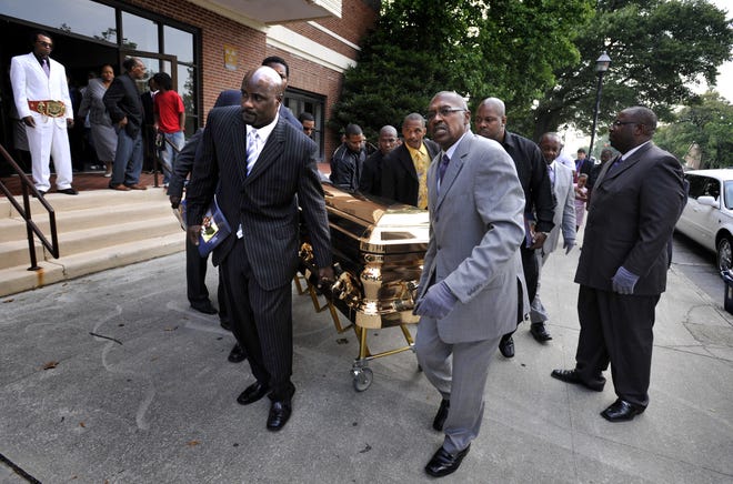 A casket containing the body of Vernon Forrest is taken out of the Bell Auditorium following a memorial service in Augusta Saturday afternoon August 1, 2009.