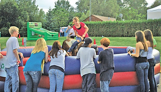 On Saturday, Sault resident Martina Enos, age 13, tackled the bull-riding pit at the Kewadin Casinos 25th Anniversary Festival. The three-day event in Sault Ste. Marie also included live entertainment from Vince Neil, Bret Michaels, Meat Loaf and 3-Doors Down, a NASCAR simulator, a baggo tournament, vendors, former Detroit Lions football players and much more.