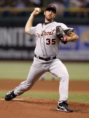 Detroit Tigers starting pitcher Justin Verlander throws in the first inning of a baseball game against the Tampa Bay Rays on Tuesday, July 27, 2010, in St. Petersburg, Fla. (AP Photo/Mike Carlson)