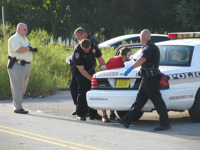 Winter Haven police take a young man into custody Wednesday morning after responding to a report that someone with a gun entered Baby Steps, Inc. Therapy Services at 790 Sixth St., N.W. The man later was identified by police as 25-year-old Edward Cecere. Wednesday, July 28, 2010