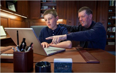 Scott G. McNealy, with his 12-year-old son, Dakota. Mr. McNealy is trying to bring open-source textbooks to classrooms, from kindergarten to high school.