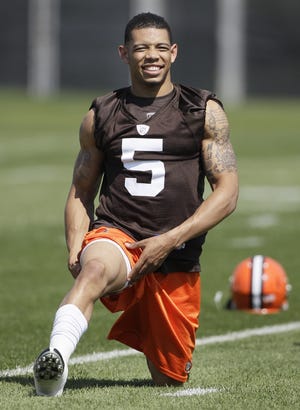 Browns first-round draft pick defensive back Joe Haden stretches during rookie NFL minicamp in April.