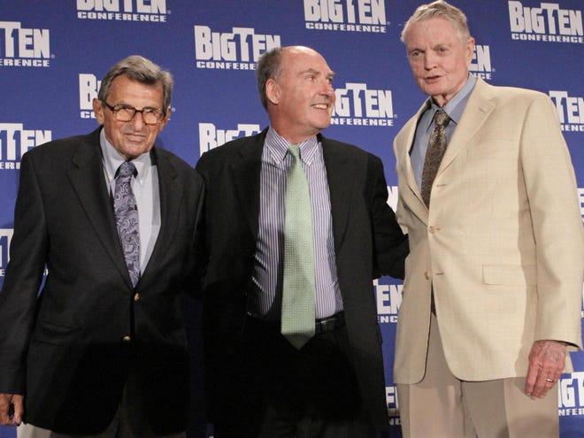 Penn State head football coach Joe Paterno, left, and Nebraska athletic director Tom Osborne, right, join Big Ten Commissioner Jim Delany on stage Monday in Chicago, at the 2010 Big 10 Media Day Kickoff. Nebraska joins the Big Ten next season, bringing the conference to 12 teams.