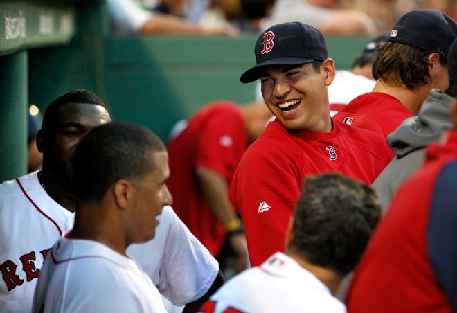Following a rehab stint at Triple-A Pawtucket, Jacoby Ellsbury, right, was happy to be back in Boston Tuesday night. The outfielder, sidelined since May 28 with fractured ribs, will be activated today. Meanwhile, Mike Lowell returned to action Tuesday, replacing the injured Kevin Youkilis at first base.