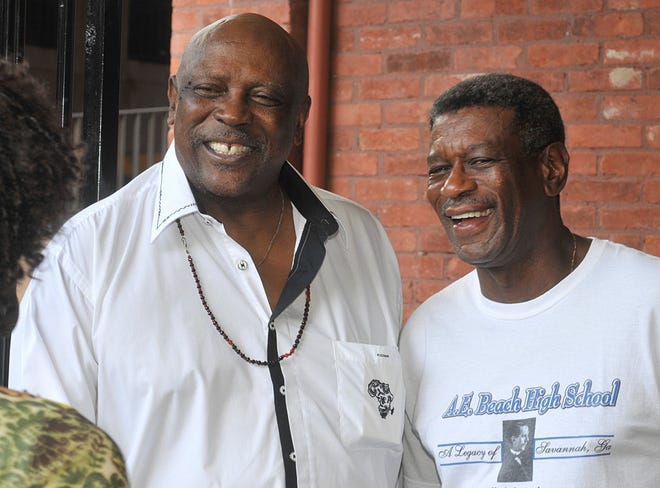 Actor Louis Gossett Jr. and former Harlem Globetrotter star Larry \u201CGator\u201D Rivers talks to a fan near Ellis Square. (Steve Bisson/Savannah Morning News)