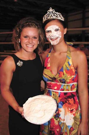 New queen Alexi Strandberg got the traditional ‘pie-in-the-face’ from last year’s queen Bethany Stapel.