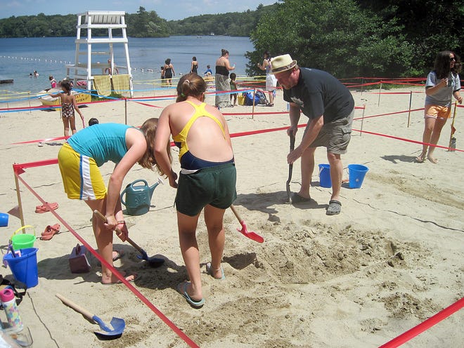 Farm Pond’s been a very popular place this summer, especially when the temperature exceeds 90 degrees. Here, beach-goers take part in the annual Sand Sculpture competition on July 18.