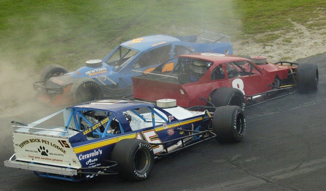 X-Mods car drivers Paul French (94), top, Corey Larson (8), middle, and Rick Ceravolo (15), bottom, crash on the tenth lap Wednesday, August 4, 2010 of their fifteen lap race on Wild n' Wacky Wednesday at the Waterford Speedbowl. Richard Brouwer of Waterford won.