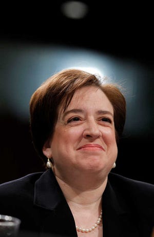 FILE - In this June 30, 2010 file photo, Supreme Court nominee Elena Kagan smiles on Capitol Hill in Washington, while testifying before the Senate Judiciary Committee hearing on her nomination. On Thursday, the Senate confirmed Kagan as the 112th justice. (AP Photo/Alex Brandon, File)