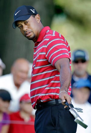 Tiger Woods watches a missed putt on the second green during the fourth round of the Bridgestone Invitational on Sunday.