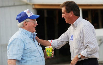 Jim Renacci, right, a Republican vying for the House in Ohio’s 16th District, campaigned Monday at the Medina County Fair.
