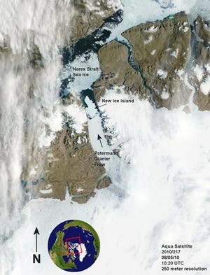 This image provided by NASA and made with the Aqua Satellite on Aug. 5, 2010 shows an ice island that has broken off the Petermann Glacier in northern Greenland. A University of Delaware researcher says the floating ice sheet covers 100 square miles (260 sq. kilometers) _ more than four times the size of New York's Manhattan Island.