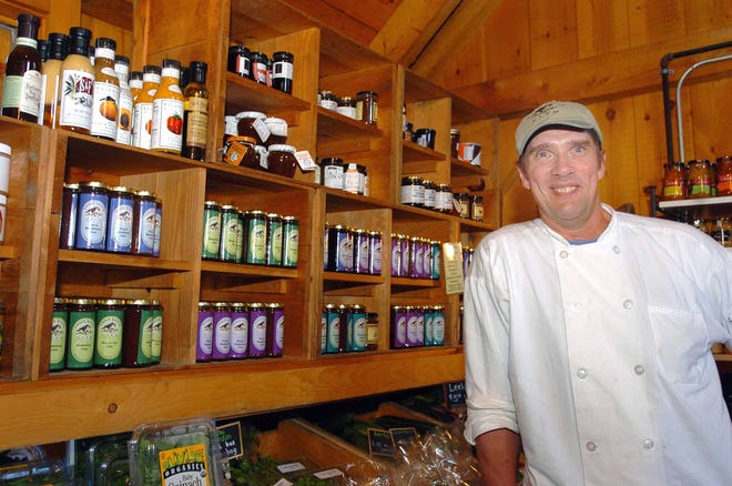Steve Cory, owner of Sweet Berry Farm stands in front of some of his products. Souza Photo 6.23.10