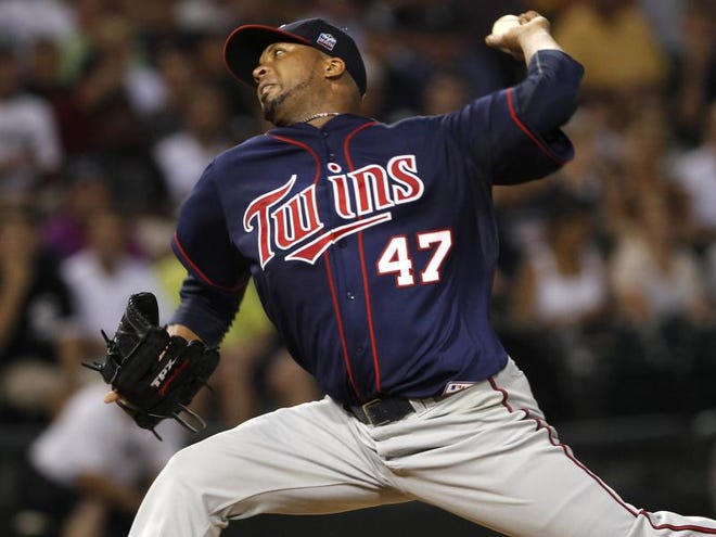 Minnesota Twins starting pitcher Francisco Liriano delivers to the Chicago White Sox in the third inning Thursday in Chicago.