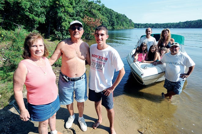 The Rossillo family returned to Oak Crest Cove last week. Phillip Rossillo, center, right, has been vacationing on the property since the 1960s.