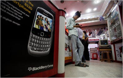 Research In Motion, maker of the popular device, is negotiating to avoid India's threat to block encrypted corporate messages.