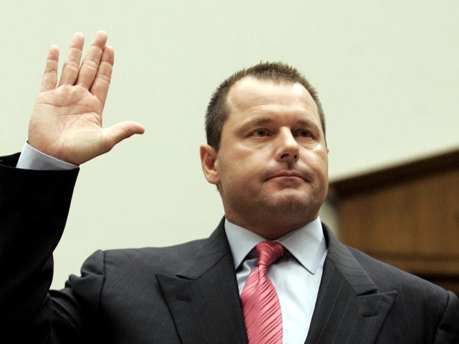 This Feb. 13, 2008, file photo shows former New York Yankees baseball pitcher Roger Clemens being sworn-in on Capitol Hill in Washington, prior to testifying before the House Oversight, and Government Reform committee hearing on drug use in baseball. The New York Times reported on its website Thursday, Aug. 19, 2010, that federal authorities have decided to indict Roger Clemens on charges of making false statements to Congress about his use of performance-enhancing drugs. (AP Photo/Susan Walsh, File)