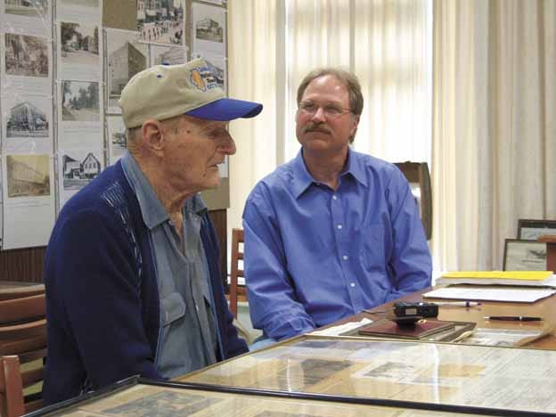 Being interviewed at the Kewanee Historical Society museum for a documentary which debuts Friday night on Iowa Public Television (IPTV) on the popularity of cornhusking in the 1930s were Hank Endress, 95, left, of Wyoming, and Frank Hennenfent of Smithshire. In 1938, Endress became one of only five huskers to pick over 50 bushels in an 80-minute contest. Hennenfent is a seven-time national champion of the revival contests of recent years, winning most recently in 2008 at Roseville.