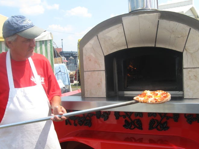 If you’re looking for a different food option at the Illinois State Fair, check out the Vero Wood-Fired Pizza booth on Grandstand Avenue. The pizzas are made in an authentic pizza oven mounted on a trailer.