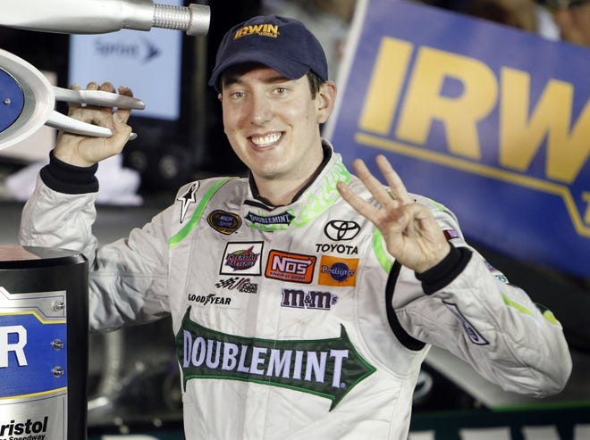 MARK HUMPHREY/Associated PressKyle Busch holds up three fingers Saturday in honor of his third race win in four days at Bristol, Tenn.