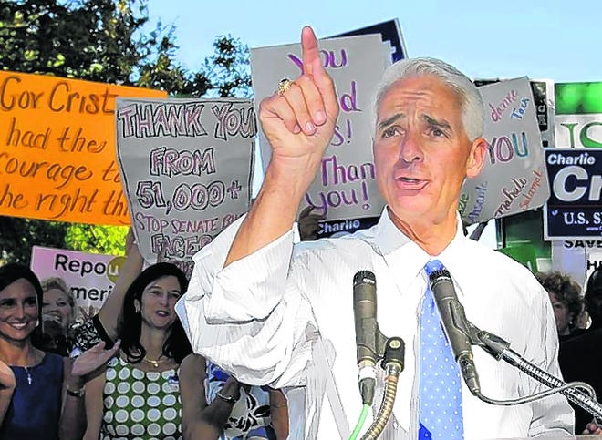 Gov. Charlie Crist speaks at an April rally after announcing his decision to 
leave the GOP and run for the Senate as an independent. Many voters are also leaving their political parties.