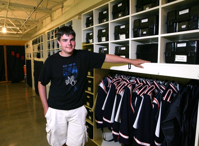 Rochester senior Michael Scott, above, and Michael Chiapetto designed and built organizational spaces for the Rochester High School marching band.