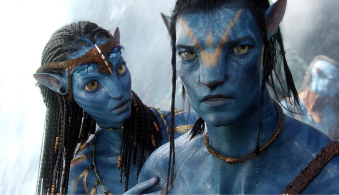 In this film publicity image released by 20th Century Fox, the character Neytiri, voiced by Zoe Saldana, and the character Jake, voiced by Sam Worthington are shown in a scene from "Avatar."
