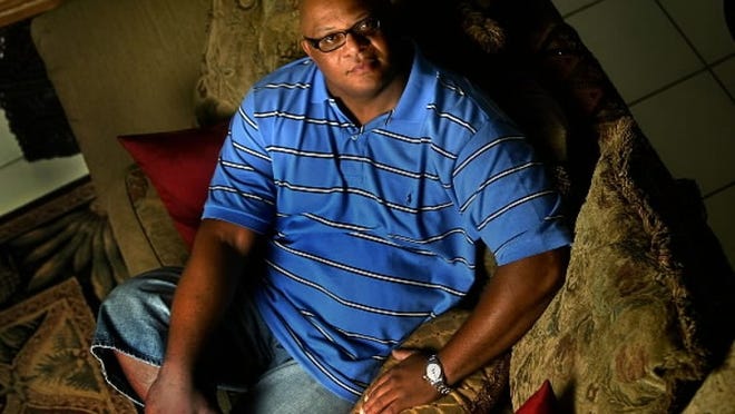File photo of Rick Curtis inside his home in West Palm Beach in 2007.