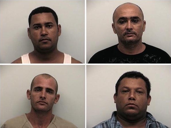 Investigators arrested four men in connection with a suspected luxury boat-theft ring. Taken into custody were (clockwise from top left) Francisco M. Cabrera, Javier G. Fernandez, Yoismel G. Utra and Pereda R. Montesino.