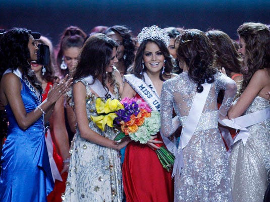 Miss Mexico Jimena Navarrete, center, is congratulated by fellow contestants after she was crowned Miss Universe, Monday, Aug. 23, 2010 in Las Vegas.