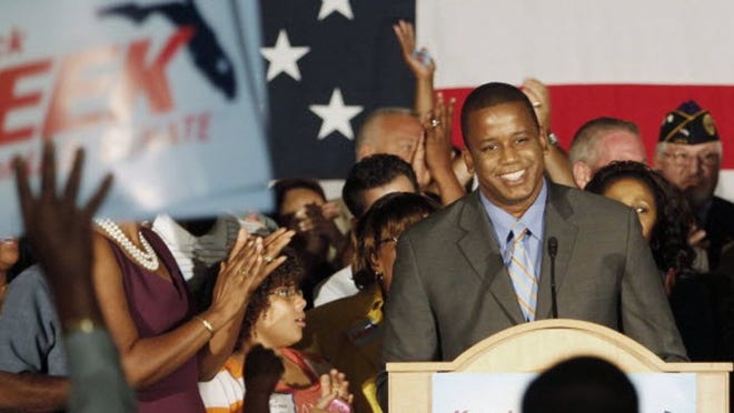 Democratic senate candidate Kendrick Meek smiles as friends, relatives and guests chant his name in Hollywood, Fla., Tuesday, Aug. 24, 2010. Meek defeated Jeff Greene for the Democratic Senate nomination. (AP Photo/Alan Diaz)
