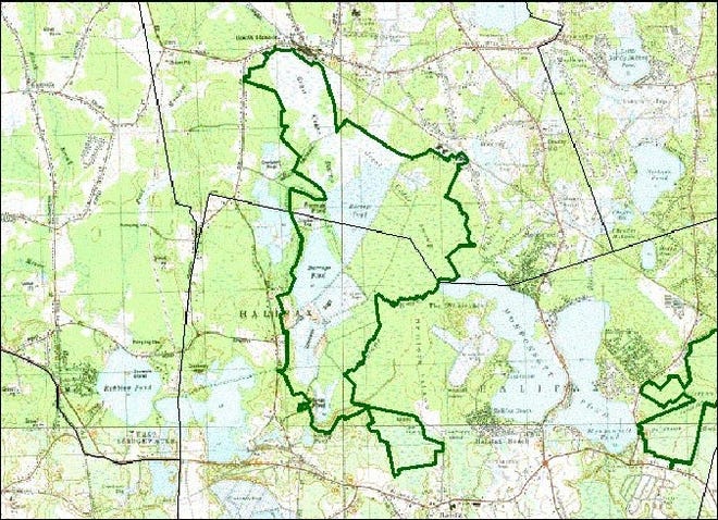 This map shows Burrage Pond, a 1,600-acre conservation area straddling the Halifax/Hanson border. In 2002, the state purchased the land from Northland Cranberry Company, but a judge decreed that the towns were owed $600,000 in taxes from the land.