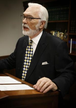 Shawnee County commissioners last week approved a settlement with former District Attorney Robert Hecht and Old Republic Surety Co., which continue to deny any liability in a suit commissioners filed in January 2009.