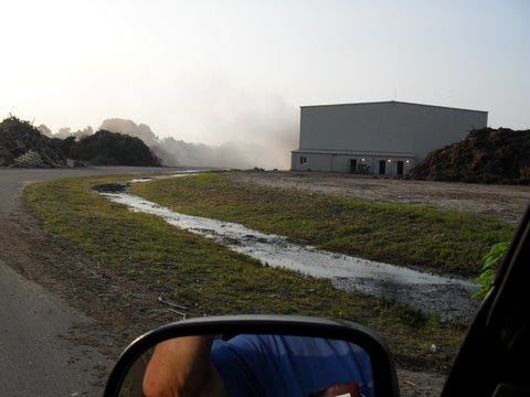 Construction debris ignites at landfill.