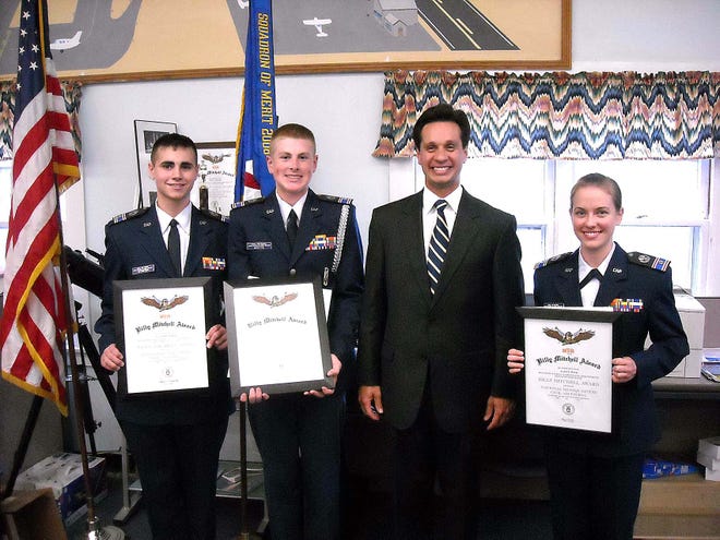 State Rep. Vinny deMacedo poses with the three recipients of the General Billy Mitchell Award: from left, Cadet 2nd Lt. Connor O’Dwyer, Cadet 2nd Lt. Cameron Myette, deMacedo, and Cadet 2nd Lt. Lydia Murdy.