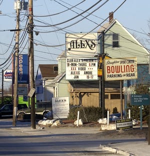 Dancers and massage workers at Club Alex’s won a cash settlement after filing a lawsuit claiming they were deprived of wages and benefits at the strip club in Stoughton.