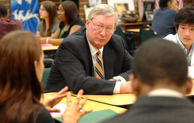Ed Pratt-Dannals listens to Ed White High School students in December during a meeting between School Board members and the students.