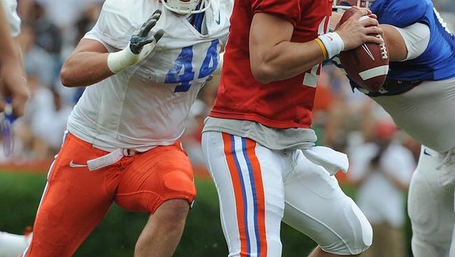 Duke Lemmens (44) will be expected to put pressure on the quarterback like he did here against John Brantley in the 2009 Florida spring game.