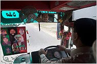 Jamshed Dasti, a lawmaker, drives a bus he donated to provide free transportation for his constituents in Muzzafargarh, Pakistan.