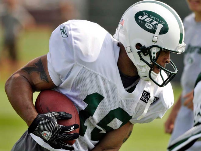 In this Aug. 4, 2010 file photo, New York Jets receiver Laveranues Coles runs after making a catch during morning practice at the team's NFL football training camp in Cortland, N.Y. Coles was released Sunday, Aug. 29, 2010, a month after the Jets brought him back to add depth at the wide receiver spot.