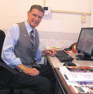 Bud Williams sits in his office at Pontiac Christian School, east of Pontiac. Williams has been employed in the education field for more than 30 years, more than 20 of those as an administrator. He replaces administrator Dean Ritter, who took a position in Cedar Rapids, Iowa, prior to the beginning of this school year.