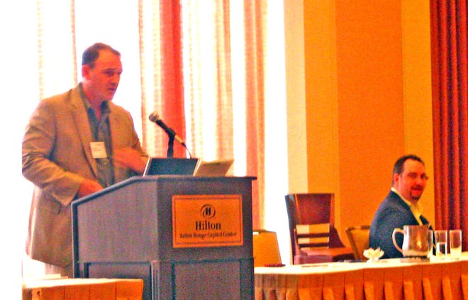 TOUTING IBERVILLE TO STATE...Iberville Environmental and permits Manager John J. Clark gives a presentation to the Keep Louisiana Beautiful program's state conference in Baton Rouge. After hearing other presenters stress the importance of “green space,” Clark invited the group to visit Iberville, which he said is 80 percent green space with its forests and wetlands, its 600 miles of waterways.