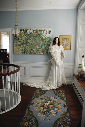 In keeping with the home's local legend, Jimmy Barker keeps a bride mannequin in the upstairs landing and peering out the front window for her groom.