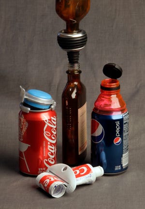 The Fizz-Keeper (left), EZ-Funnel (center), Bottle Top (right) and Squeezeit (foreground) are all designed to help buyers save money.